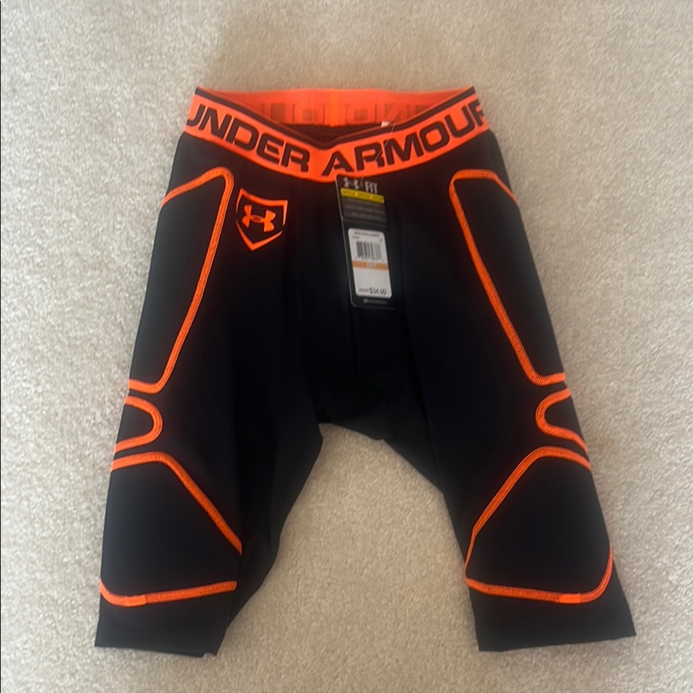 Under Armour Lightly Padded Black Shorts with Vibrant Orange Accents
